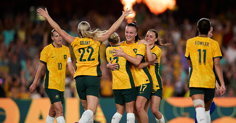 The Matilda's celebrating a goal in front of fans at suncorp stadium Brisbane Australia